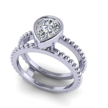 Pear shaped Victoria Tina Ring Featuring  in 14K Gold 0.90 Carats