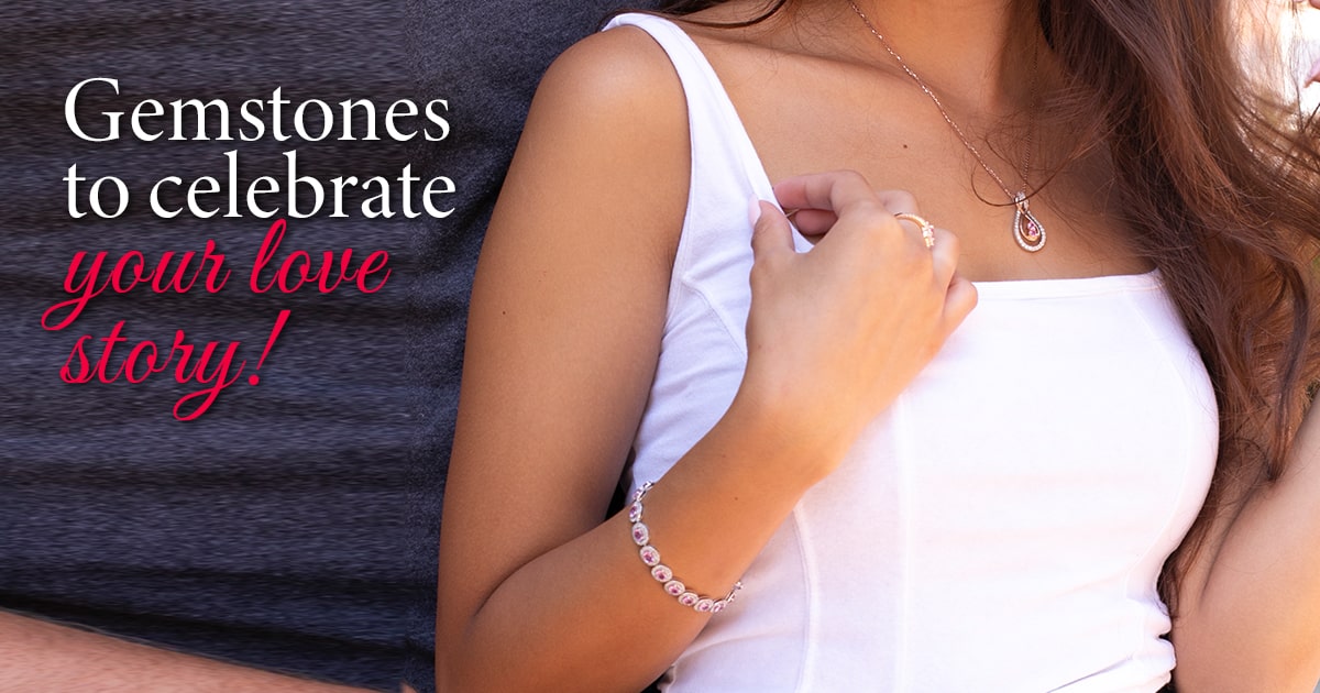 A woman wearing gemstone jewelry, including a pendant necklace, bracelet, and ring, with text that reads “Gemstones to celebrate your love story!”