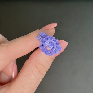 3D-printed wax prototype of the custom ring to check size, shape, and details.