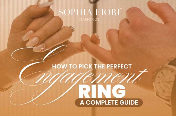 Close-up of a couple linking pinky fingers, featuring a diamond ring, with text overlay “How to Pick the Perfect Engagement Ring – A Complete Guide” by Sophia Fiori Diamonds.