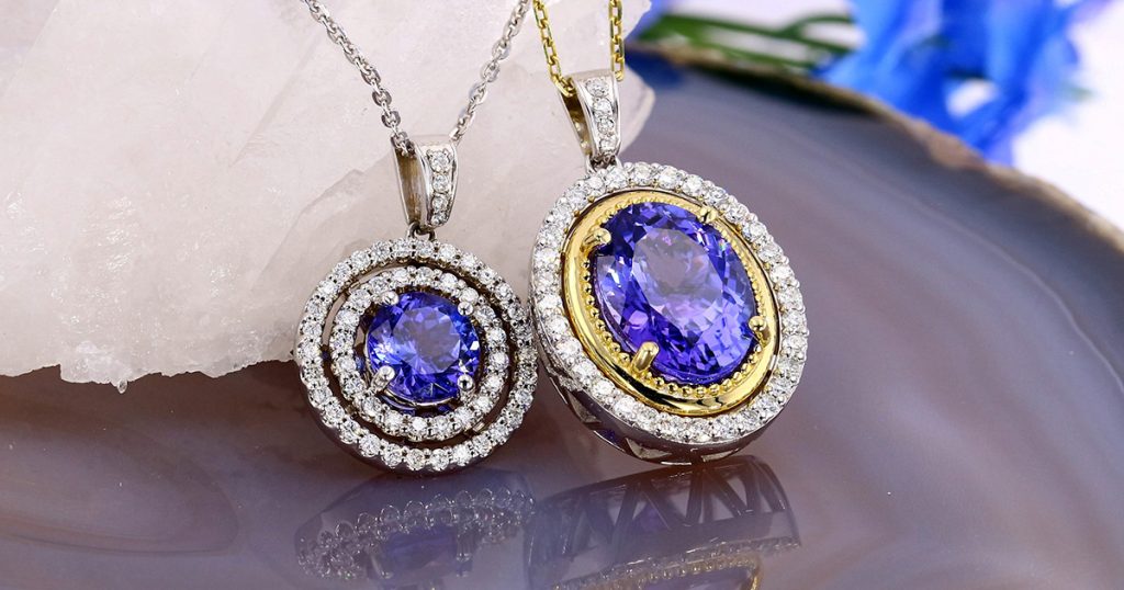 Two tanzanite pendants with diamond halos in white and yellow gold settings from Sophia Fiori’s December birthstone jewelry collection.